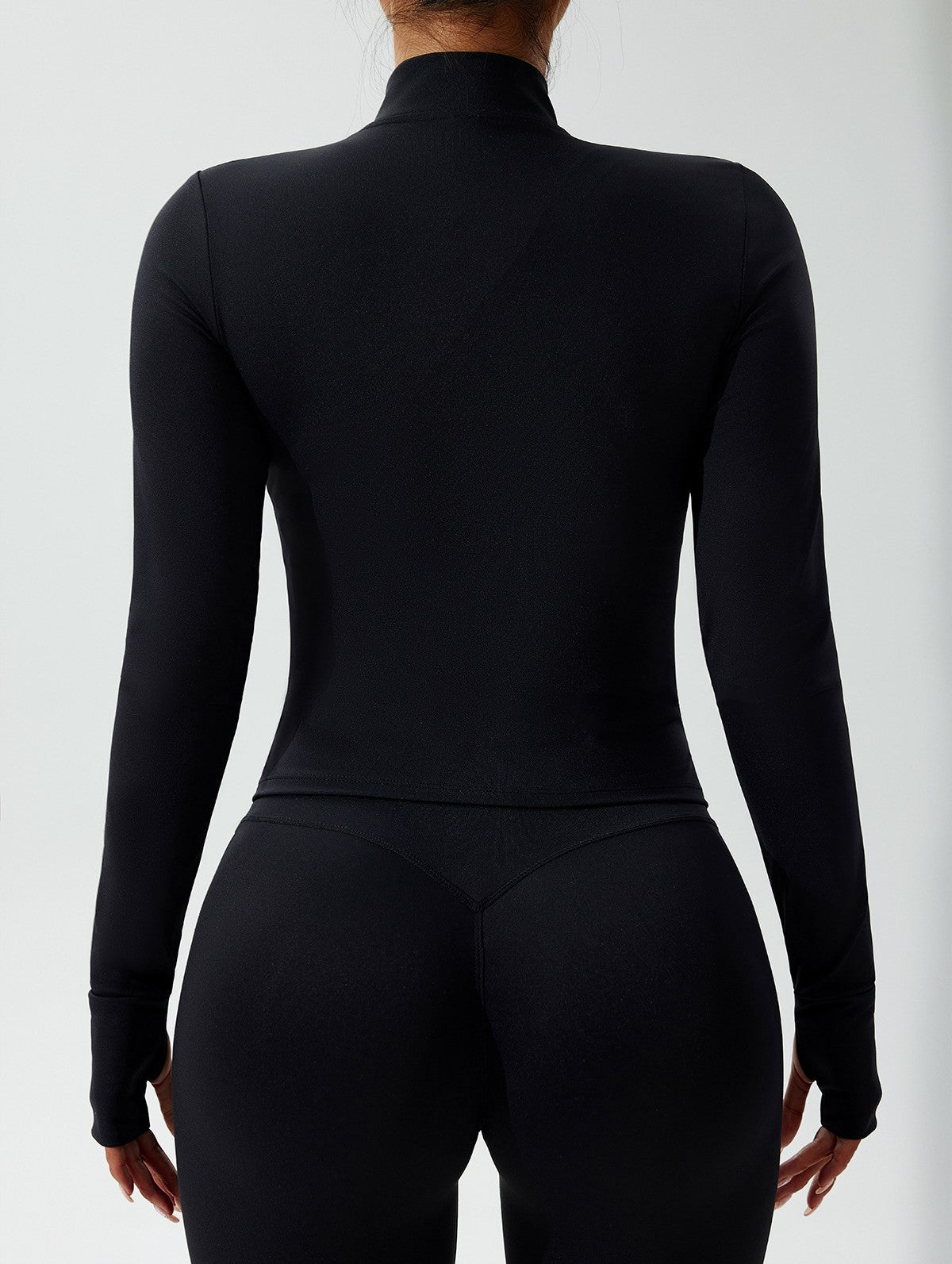 Warm Essence - Chaqueta ajustada con largo clásico y cremallera frontal.